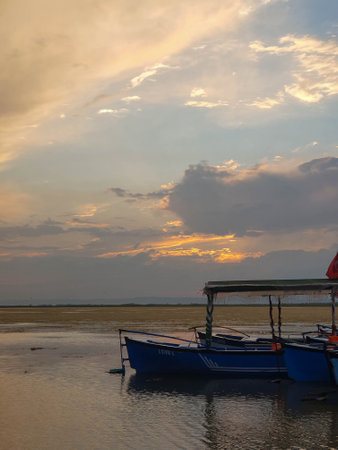 Fishing boats in the sea at sunset, IÅÄ±klÄ±, Denizliの写真素材