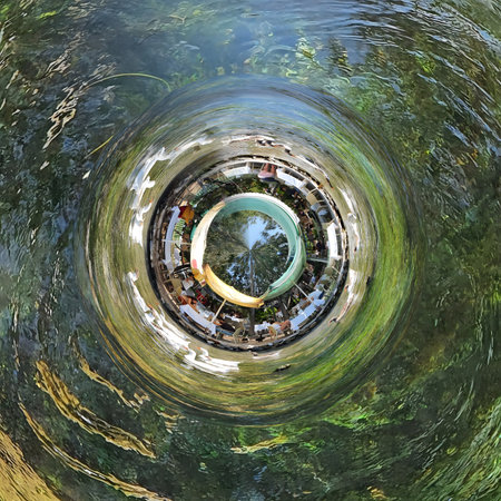 360 degree spherical panoramic aerial view of city streets and parks with beautiful reflection in water. Little planet transformation of spherical panorama 360 degrees.の写真素材