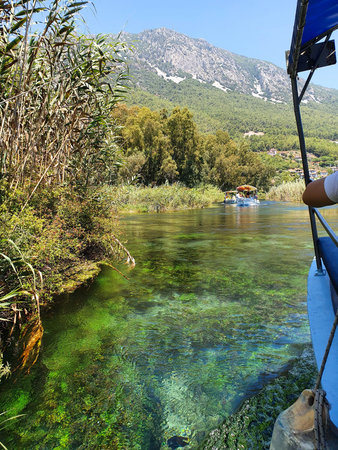 Boat trip on the river in the mountains.の写真素材