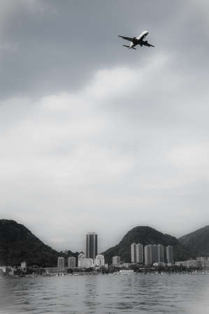View of an airplane flying over the city of Rio de Janeiroの写真素材