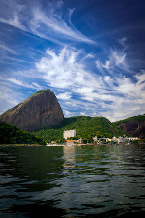 View of the Sugar Loaf from a boat at Baia de Guanabara in Rio de Janeiroの写真素材