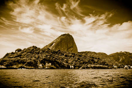 View of the Sugar Loaf from a boat at Baia de Guanabara in Rio de Janeiroの写真素材