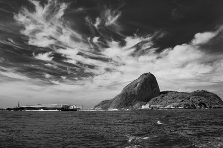 View of the Sugar Loaf from a boat at Baia de Guanabara in Rio de Janeiro