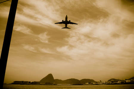 View of an airplane flying over the city of Rio de Janeiroの写真素材