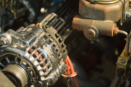 Detail of the engine of an antique car showing its partsの写真素材