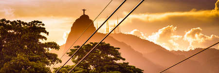 Metal cables with the Christ The Redeemer statue in the background, Corcovado, Rio de Janeiro, Brazilの写真素材