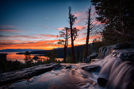 Water falling into a lake, Lake Tahoe, Sierra Nevada, California, USAの写真素材