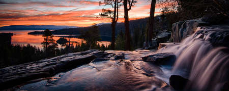 Water falling into a lake, Lake Tahoe, Sierra Nevada, California, USAの写真素材