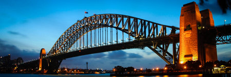 Scenic view of Sydney harbour bridge illuminated at dawn, Australia 