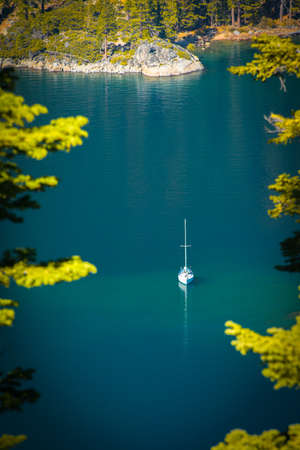 High angle view of a boat in a lake, Emerald Bay, Lake Tahoe, California, USAの写真素材