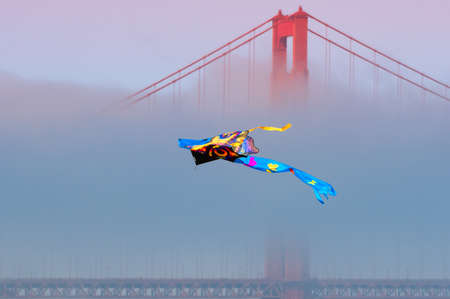 Kite flying in front of the Golden Gate Bridge, San Francisco Bay, San Francisco, California, USAの写真素材