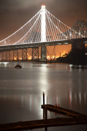 View of the Bay Bridge lit up at night, San Francisco, North Beach, California, USAの写真素材