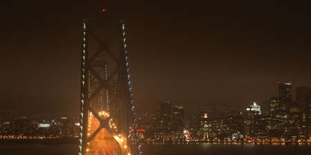 Elevated view of the Bay Bridge lit up at night, San Francisco, North Beach, California, USAのeditorial素材