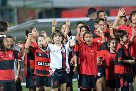 Rio, Brazil - jun 28, 2017: Children in match between Flamengo and  Santos by the Brasil Cup in Ilha do Urubu Stadiumのeditorial素材
