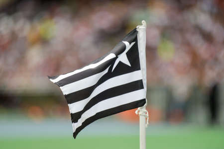 Rio, Brazil - december 03, 2017: Botafogo corner flag in match between Botafogo and  Cruzeiro by the Brazilian championship in Nilton Santos Stadiumのeditorial素材