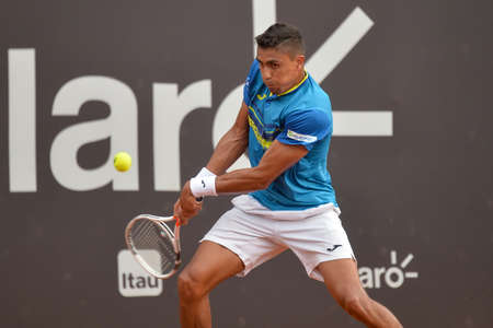 Rio de Janeiro, Brazil - february 20, 2017: Thiago MONTEIRO (BRA) x Pablo Cuevas (URU) classificatory game during Rio Open 2018 held at the Jockey Club Brasileiro.のeditorial素材
