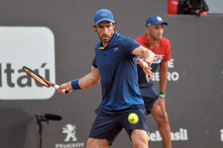 Rio de Janeiro, Brazil - february 20, 2017: Thiago Monteiro (BRA) x Pablo CUEVAS (URU) classificatory game during Rio Open 2018 held at the Jockey Club Brasileiro.のeditorial素材