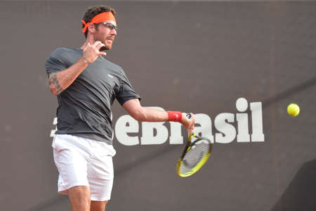 Rio de Janeiro, Brazil - february 20, 2017: Pablo Adujar (ESP) x Geral MELZER (AUT)  classificatory game during Rio Open 2018 held at the Jockey Club Brasileiro.のeditorial素材