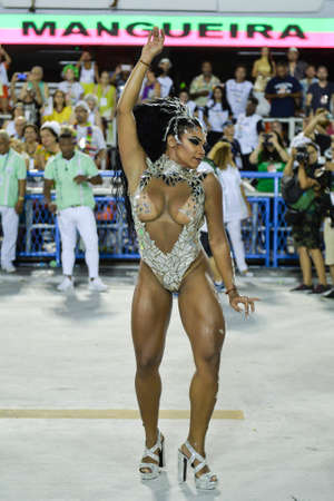 Rio, Brazil - february 12, 2018: Samba School parade in Sambodromo. Mangueira during parade of the carioca carnival in the Marques de Sapucaiのeditorial素材