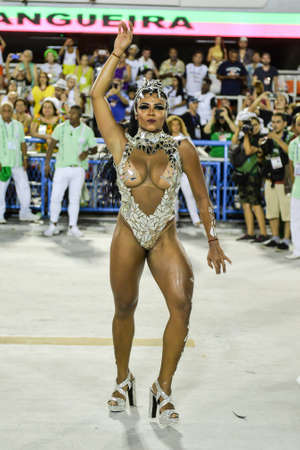 Rio, Brazil - february 12, 2018: Samba School parade in Sambodromo. Mangueira during parade of the carioca carnival in the Marques de Sapucaiのeditorial素材