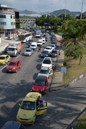 Rio de Janeiro, Brazil - may 25, 2018:  Because of the truck drivers' strike the city faces lack of fuel. The drivers queue to fill the tank at the gas stationsのeditorial素材