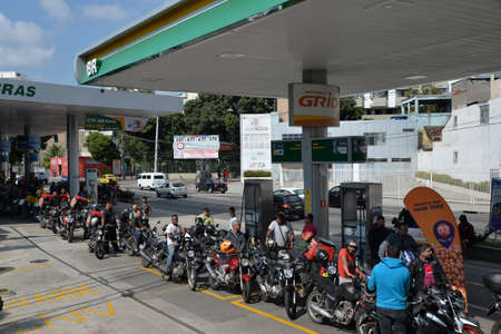 Rio de Janeiro, Brazil - may 25, 2018:  Because of the truck drivers' strike the city faces lack of fuel. The drivers queue to fill the tank at the gas stationsのeditorial素材