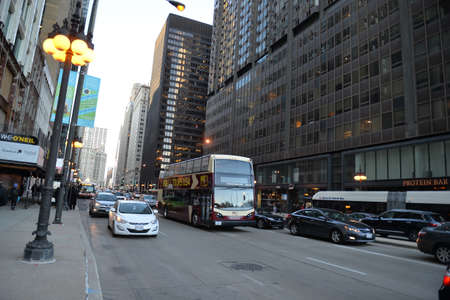 Chicago, Usa - march 14, 2018: Passenger turism bus passing through a street in the city of Chicago downtownのeditorial素材