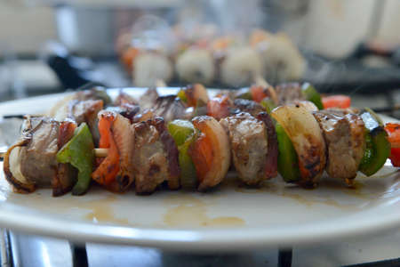mixed barbecue skewer of raw meat and vegetablesの写真素材