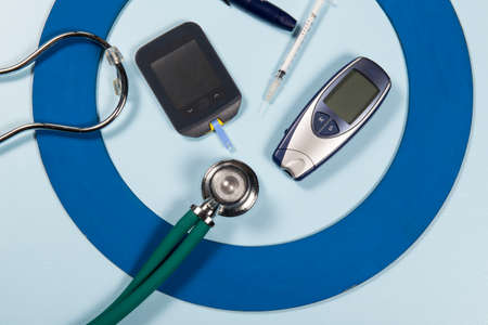 Blue circle with some Diabetes equipment do treatment the diseaseの写真素材