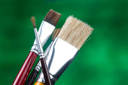 detail of brush bristles on green background.の写真素材