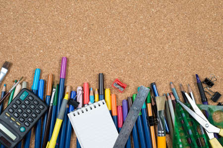 various stationery, arranged on the underside of a cork.の写真素材