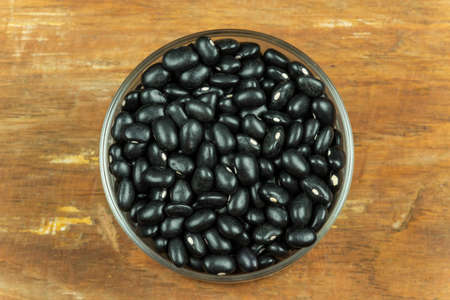 Black beans in glass pot. minimally processed foodの写真素材