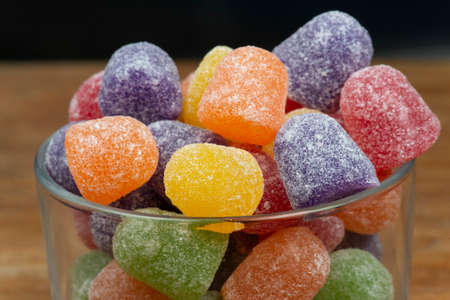 glass jar with jam of jujube on a wooden tableの写真素材