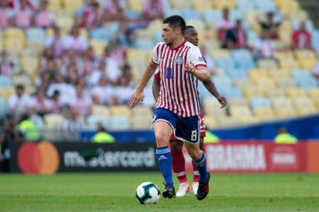 Rio de Janeiro, Brazil - June 16, 2019: R. Rojas of Paraguay kicks the ball during the 2019 America Cup Group B game between Paraguay and Qatar at Maracana Stadium.のeditorial素材