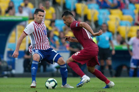 Rio de Janeiro, Brazil - June 16, 2019: Boualem Khoukhi of Qatar kicks the ball during the 2019 America Cup Group B game between Paraguay and Qatar at Maracana Stadium.のeditorial素材