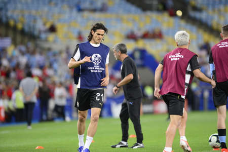 Rio de Janeiro, Brazil - June 24, 2019: Cavani Gomez makes the warm up for the match between Uruguay and Chile in the Copa America, in the stadium of Marcanaのeditorial素材