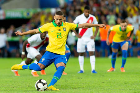 Rio, Brazil - July 7, 2019: Richarlison of Brazil kicks the ball during the 2019 America Cup finals game between Brazil and Peru at Maracana Stadium.のeditorial素材