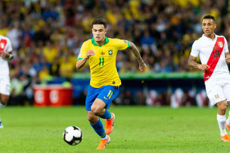 Rio, Brazil - July 7, 2019: Philippe Coutinho of Brazil kicks the ball during the 2019 America Cup finals game between Brazil and Peru at Maracana Stadium.のeditorial素材