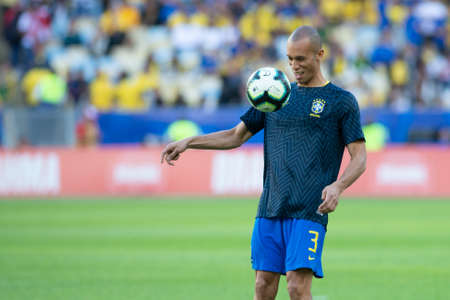 Rio, Brazil - July 7, 2019: Joao Miranda of Brazil entering the field before the CONMEBOL 2019 America Cup finals at Maracana Stadium.のeditorial素材