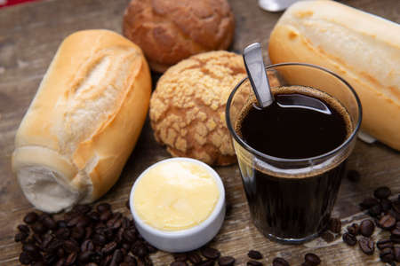 Brazilian traditional black coffee with french breadの写真素材