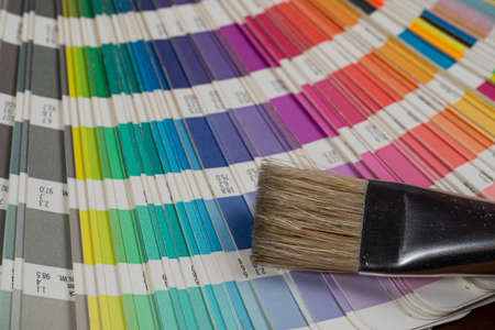 printed color swatch with paint brushの写真素材