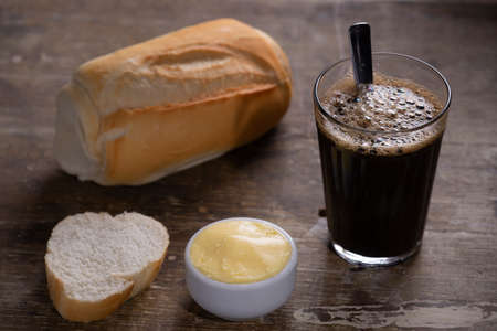 Brazilian traditional black coffee with french breadの写真素材