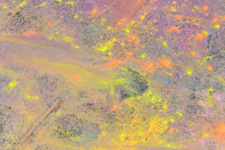 abstract background of colored powder on the floor.