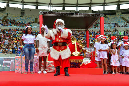 Rio de Janeiro, Brazil - december 23, 2019: Santa Claus parades at MaracanÃ£ Stadium, with children in the stands, marks the beginning of Christmas in the cityのeditorial素材