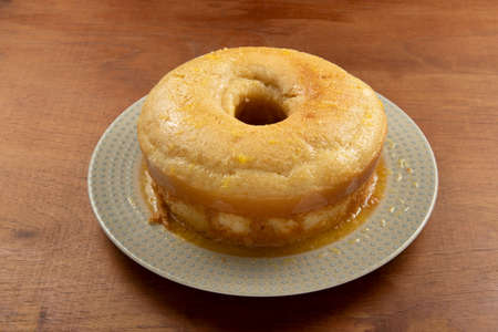 homemade orange cake in round shape with holeの写真素材