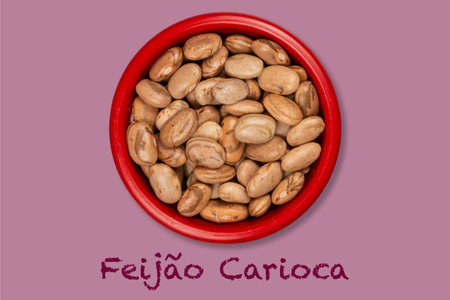 bowl with raw carioca beans (text written in Portuguese), seen from above