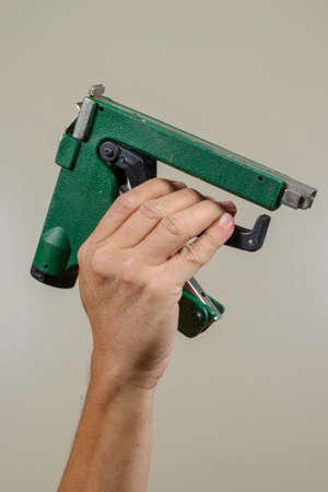 industry worker hand holding mechanical toolの写真素材