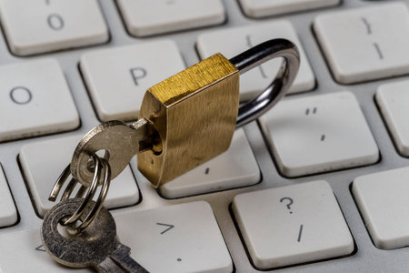 computer / internet security concept with a padlock on a keyboard