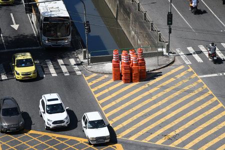 Rio, Brazil - january 30, 2021 - moving cars on main street showing pedestrian lane on sunny day