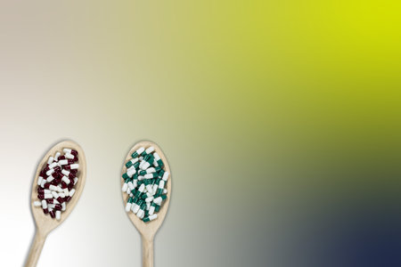 Wooden spoons with medicines to symbolize how to choose the best medicine for your disease